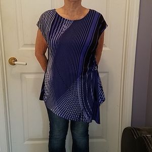 Asymmetrical patterned top with buckle accent